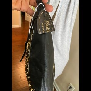 Vintage Gold studded genuine leather canoe shaped cross body bag